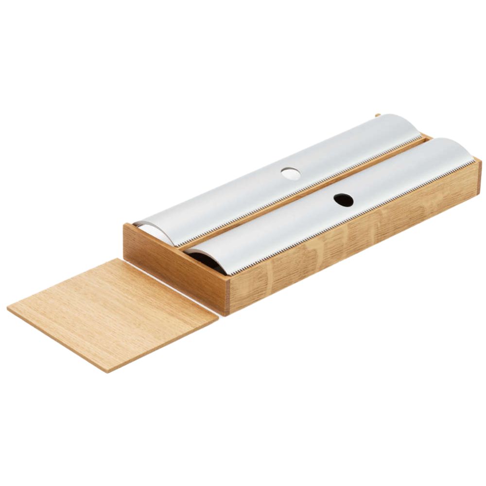 Der FineLine LiniQ Folienhalter ist ein rechteckiger Organizer aus Holz mit zwei silbernen zylindrischen Abdeckungen und einem Schiebedeckel, perfekt für die moderne Küche, um Frischhaltefolien ordentlich aufzubewahren und abzurufen.