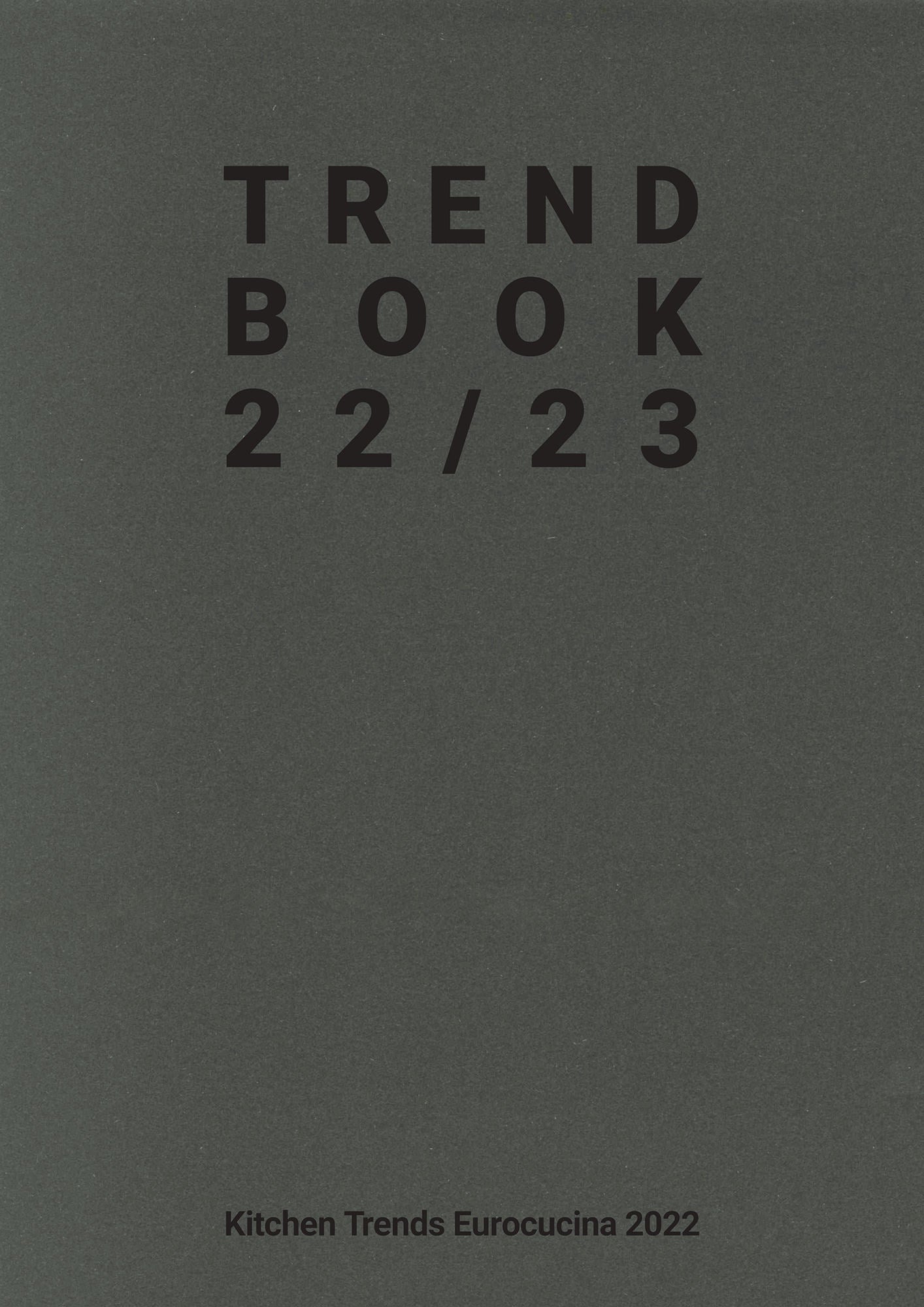 Dunkelgrauer Einband mit großer schwarzer Schrift "TREND BOOK 22/23" und kleinerer Schrift am unteren Rand "Kitchen Trends Eurocucina 2022".